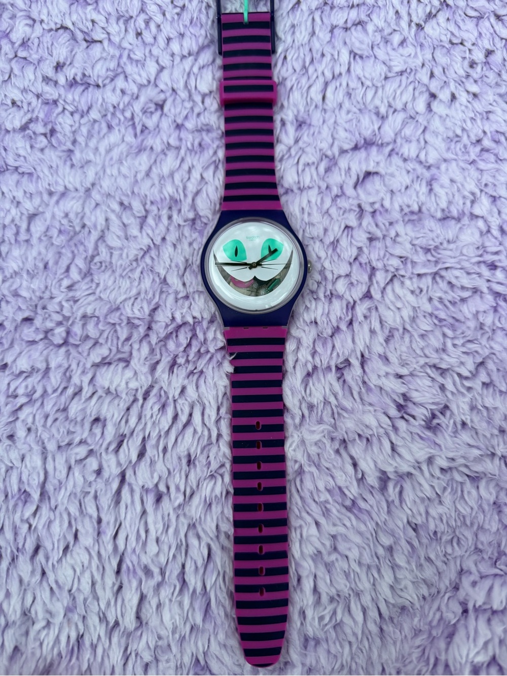 Swatch Cheshire Cat face watch